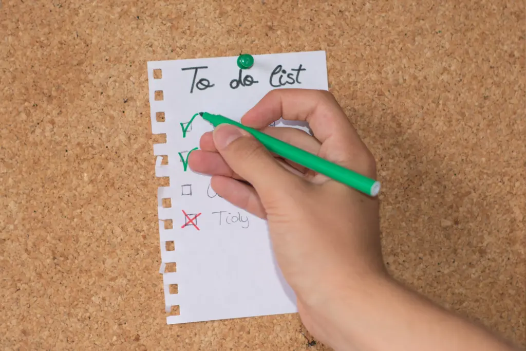 Illustration of checking off 10 small daily wins to track progress in addiction recovery.